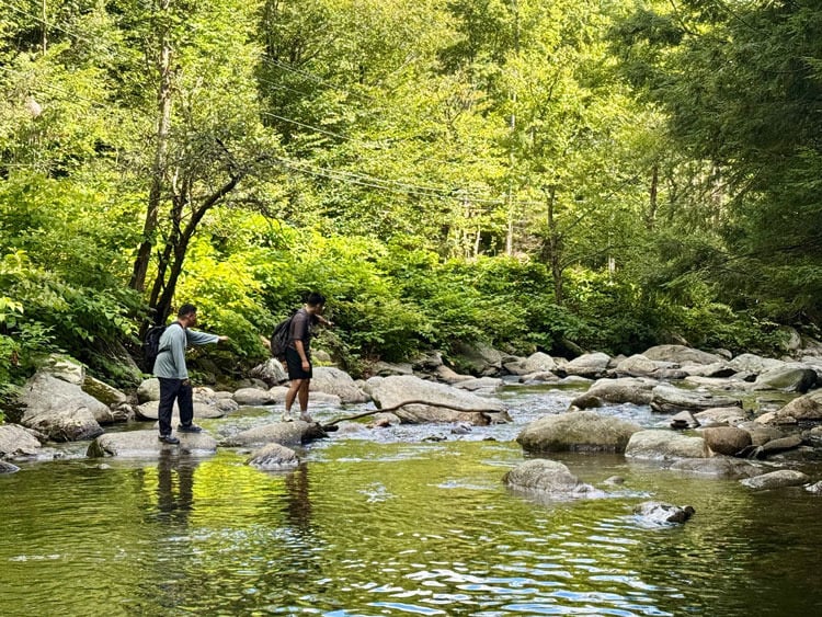 girls hiking mountain