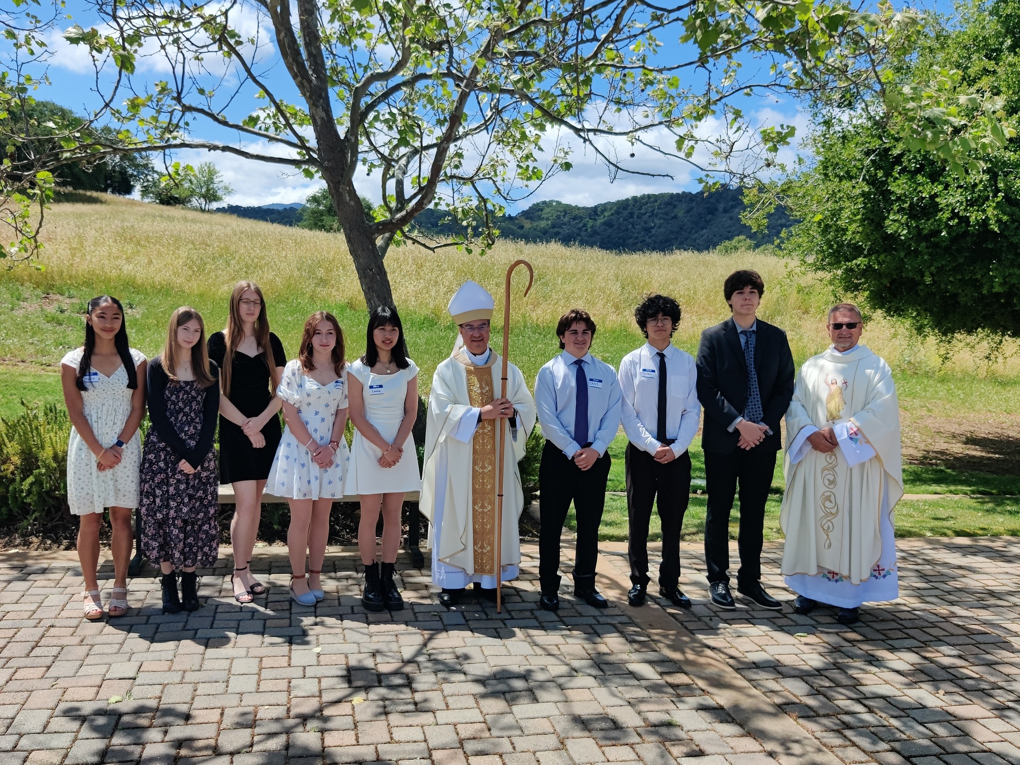 st anthony 2024 confirmation class with bishop cantu and father tad