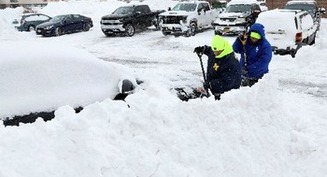 Priest weathers Christmas blizzard on fireboat celebrating Mass for two