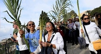 'We are not alone, abandoned or afraid,' patriarch of Jerusalem says on Palm Sunday