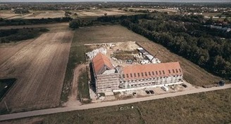 Polish state agency raids three houses run by religious congregation, arrests priest