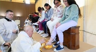 Tears flow as pope washes feet of women inmates at Rome prison