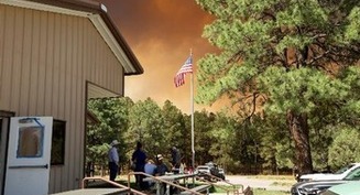 'Lots of pain' as families lose everything in New Mexico wildfires, says parish volunteer