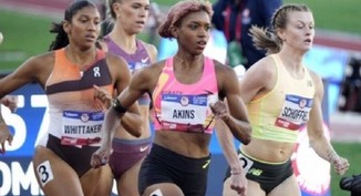 Siblings feel love, support at raucous Olympic send-off at Maryland Catholic high school