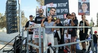 As war frightens away tourists, Catholic activists pray for peace during Holy Land pilgrimage