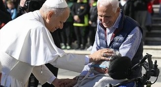 One can't serve God and money, pope says on day he signs text on poverty