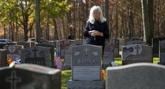 What are appropriate prayer intentions when praying for the souls of the dead?