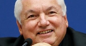 Warm, welcoming, French cardinal works with migrants, Mediterranean