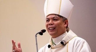 Once a child refugee, Phoenix priest ordained as diocese's second auxiliary bishop