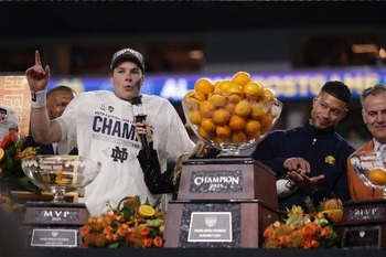 Notre Dame players head to championship formed by pre-game Masses, saint devotions