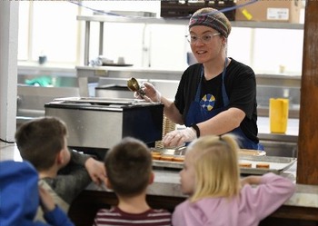 School's head cook uses her culinary skills to help kids grow in their faith