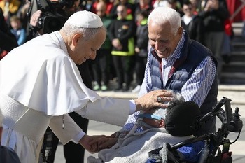 One can't serve God and money, pope says on day he signs text on poverty