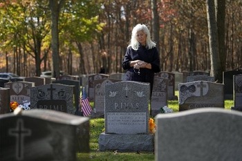 What are appropriate prayer intentions when praying for the souls of the dead?