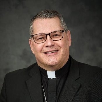 Taking on extra duties as pastor 'allows me to really respond to flock,' says Syracuse bishop