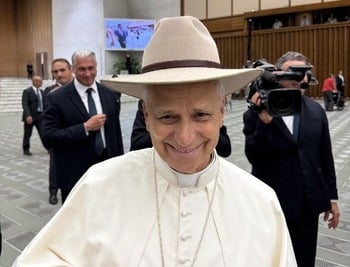 Sydney couple raise the roof with Pope Leo hat trick
