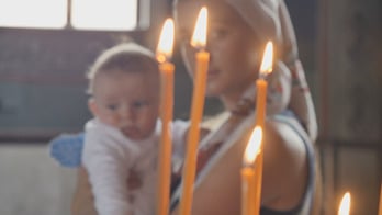 Baptism provides light in darkness, gateway to heaven, pope says