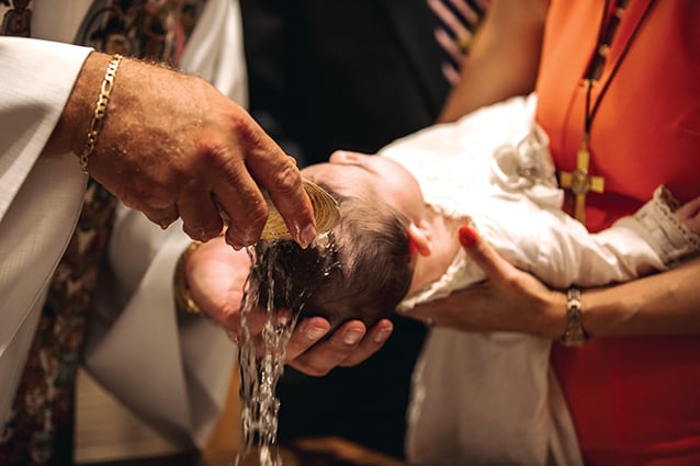 Baby being baptized