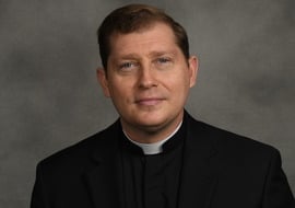 Father Eric Ayers