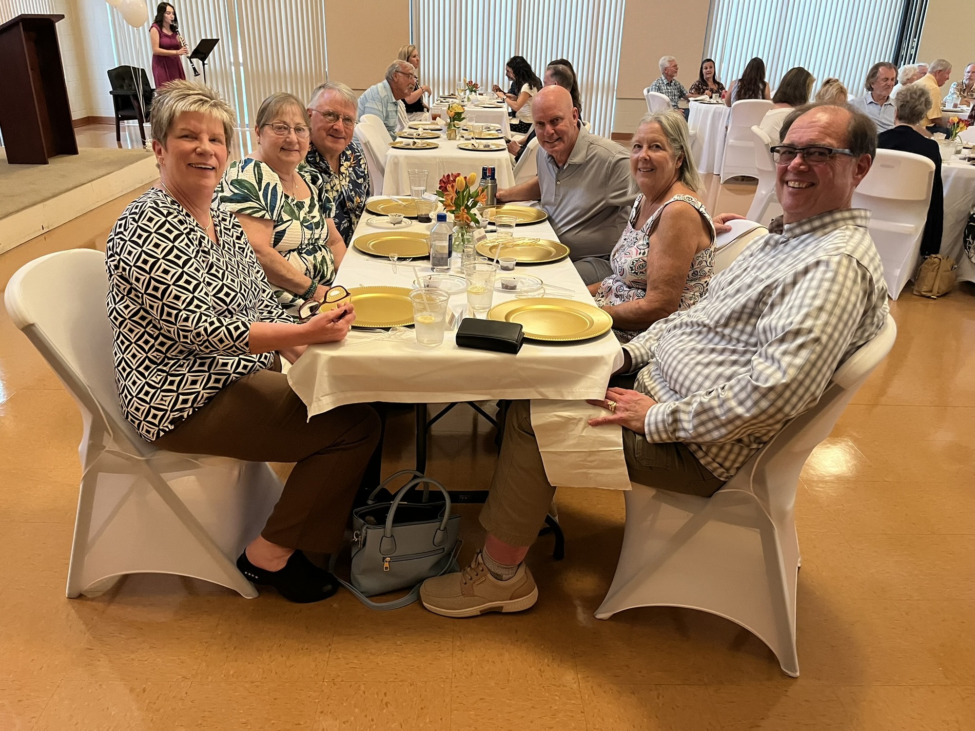 Image of a diverse group of people gathering