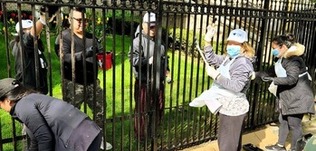 Brooklyn OLPH Parishioners Come Together to Paint Parish Fence!