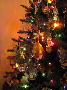 Christmas tree with reflections on wall
