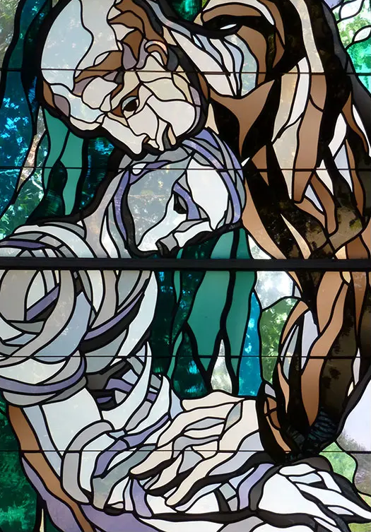 stained glass image kiss close up