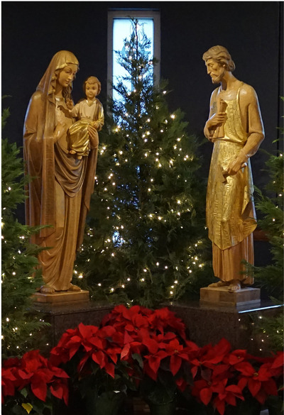 image of statues depicting Mary holding baby Jesus and Joseph