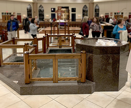 image of baptismal font following Mass