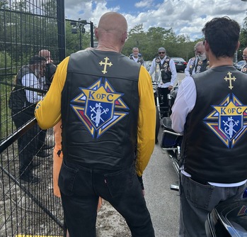 Archbishop Wenski leads Knights on Bikes to pray rosary at Alligator Alcatraz