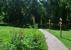 Stations of the Cross trail during summer at Franciscan Retreats and Spirituality Center in Prior Lake MN. Home of Catholic Spiritual Retreats