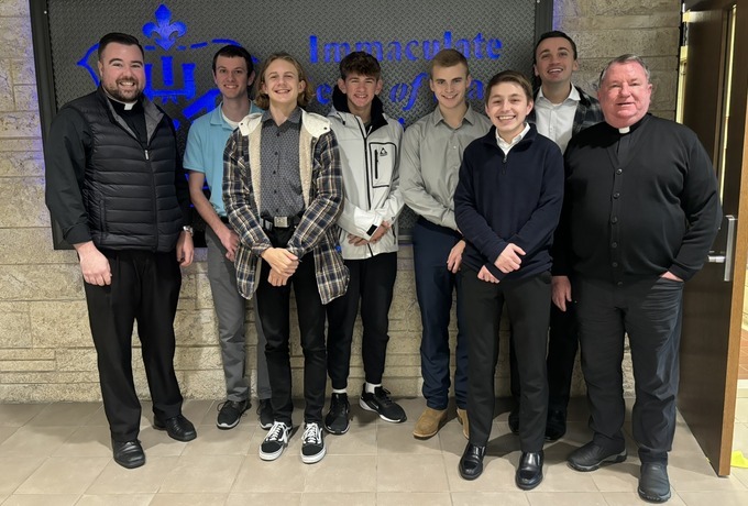 Father Hughes shares diocese history with seminarians