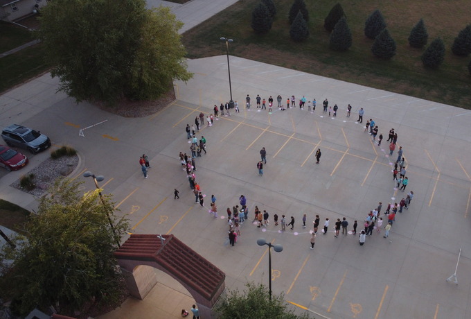 St. Therese of Lisieux religious ed living rosary held
