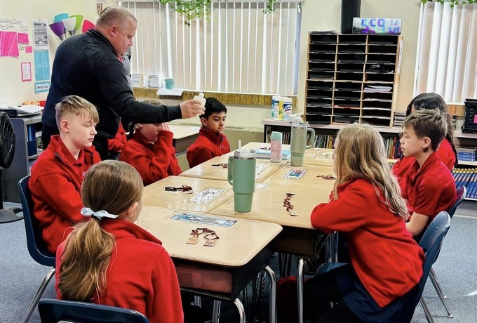 KCs gift scapulars to students