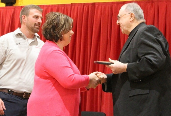 Father Collison receives Kuemper award