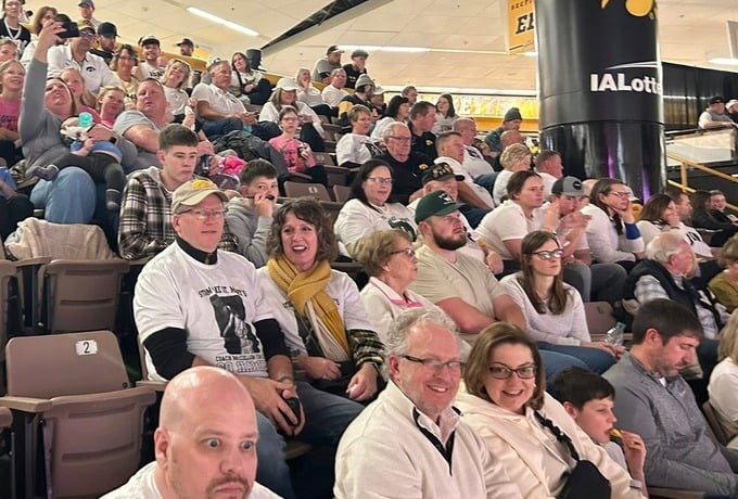 SLSM alumni gather to cheer on Iowa coach and fellow graduate