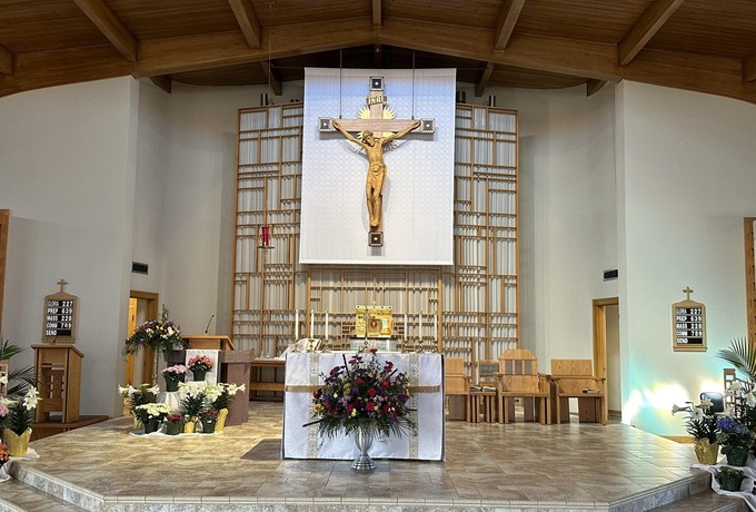 Mass carries on despite standoff