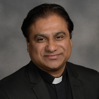 Rev. Alex Carmel