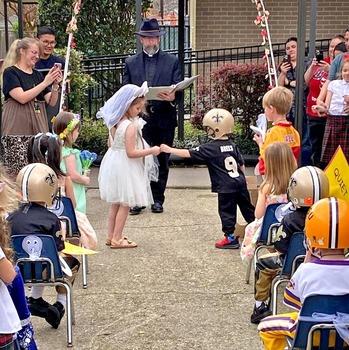 ‘Q’ and ‘U’ exchange quiet, quasi-vows at quaint St. Clement quarters