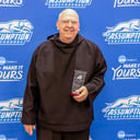 ‘Spiritual mentor and unwavering supporter,’ Father Gallagher inducted into Athletic Hall of Fame