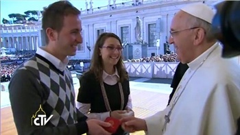 Pope Francis greets engaged couples