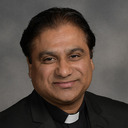 Rev. Alex Carmel